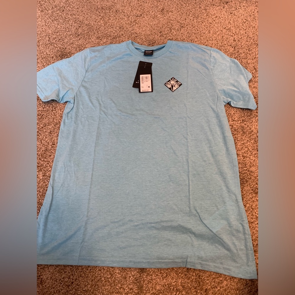 2 Brand new Oakley shirtS. Size M. Was a gift before a breakup in relationship.